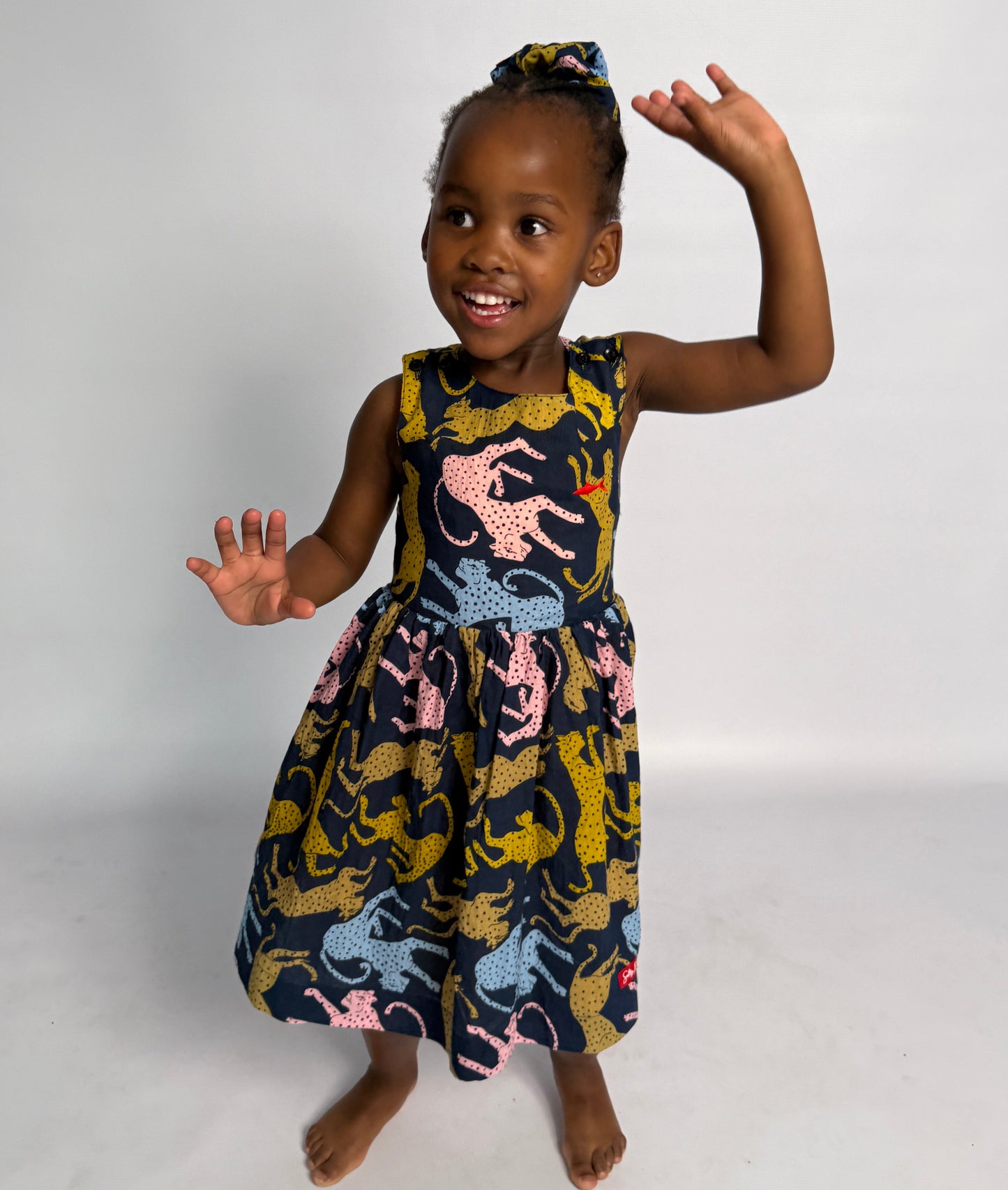 Girls Criss Cross back Dress - Cheetah on Navy