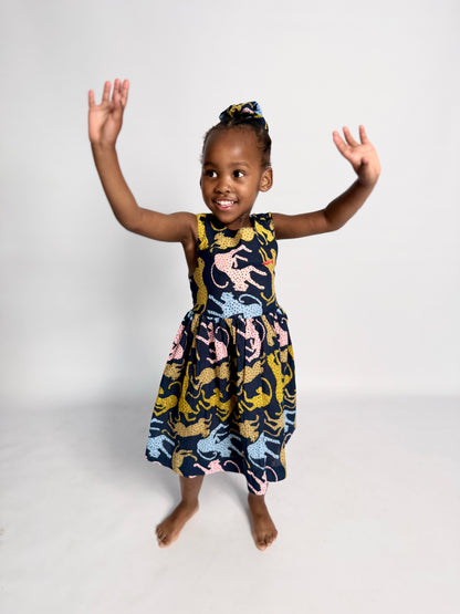 Girls Criss Cross back Dress - Cheetah on Navy