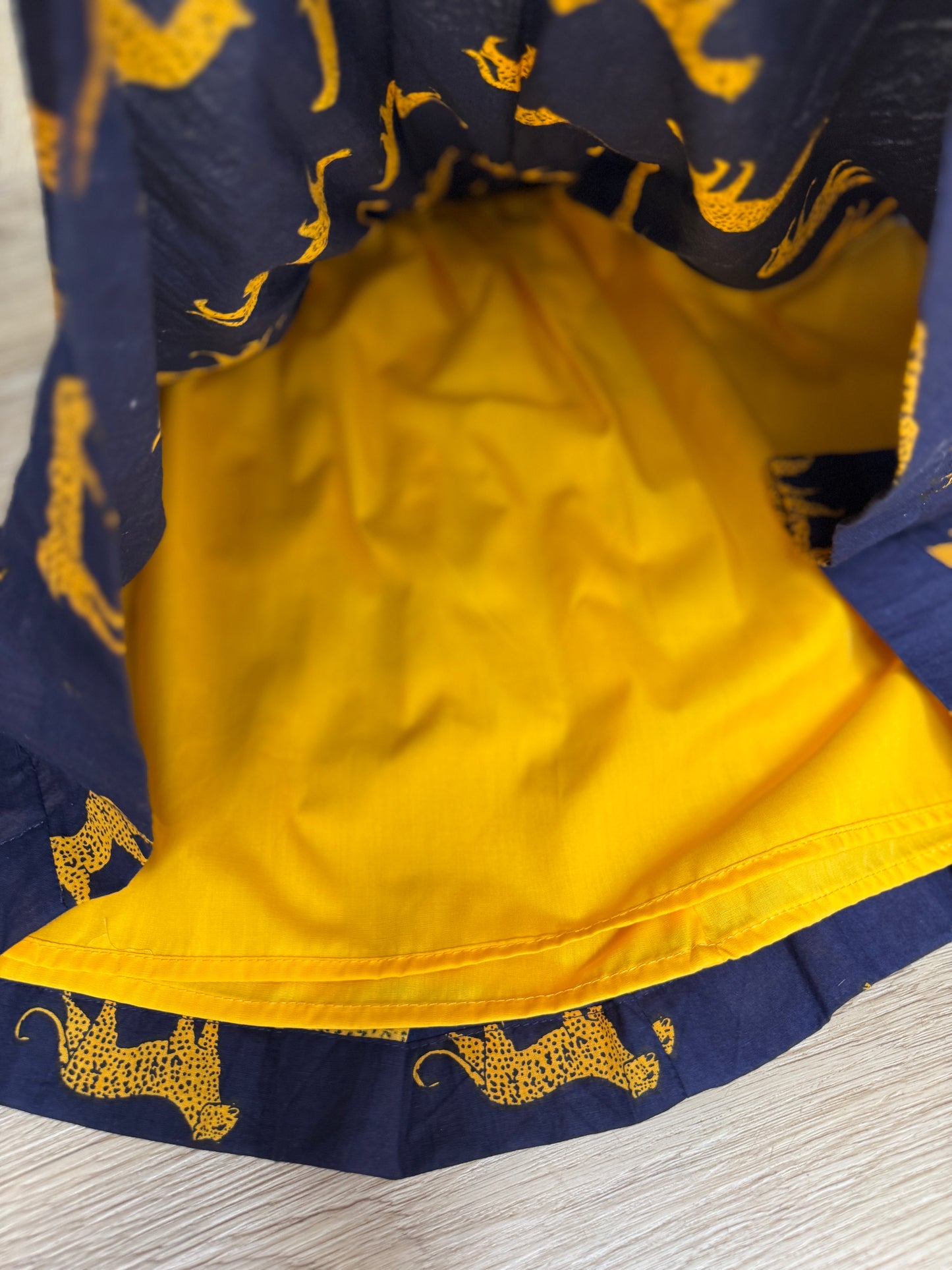 Girls Criss Cross back Dress - Navy w Orange Leopards