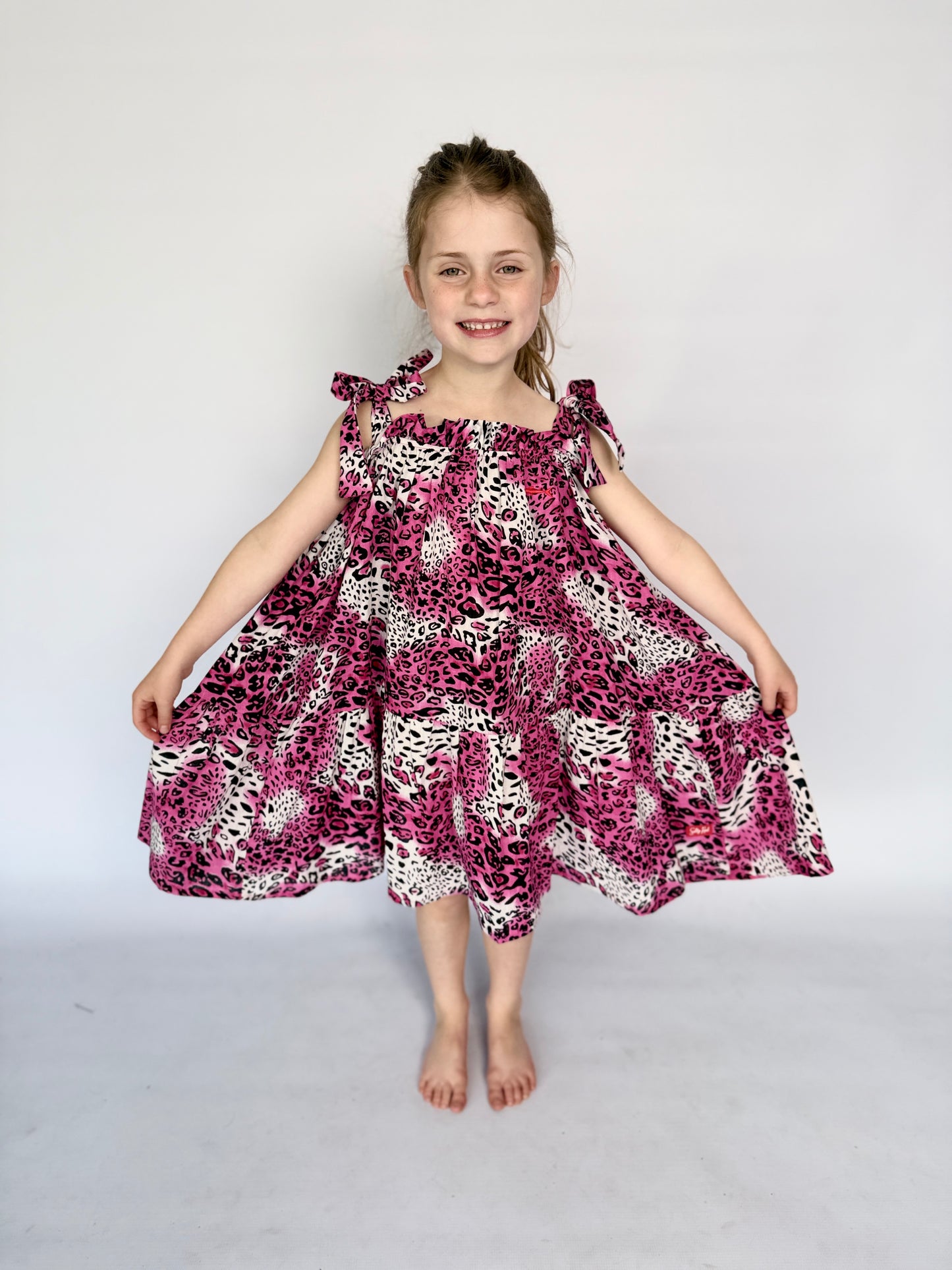 Girls Swirly Dress - Bright Pink Animal Print