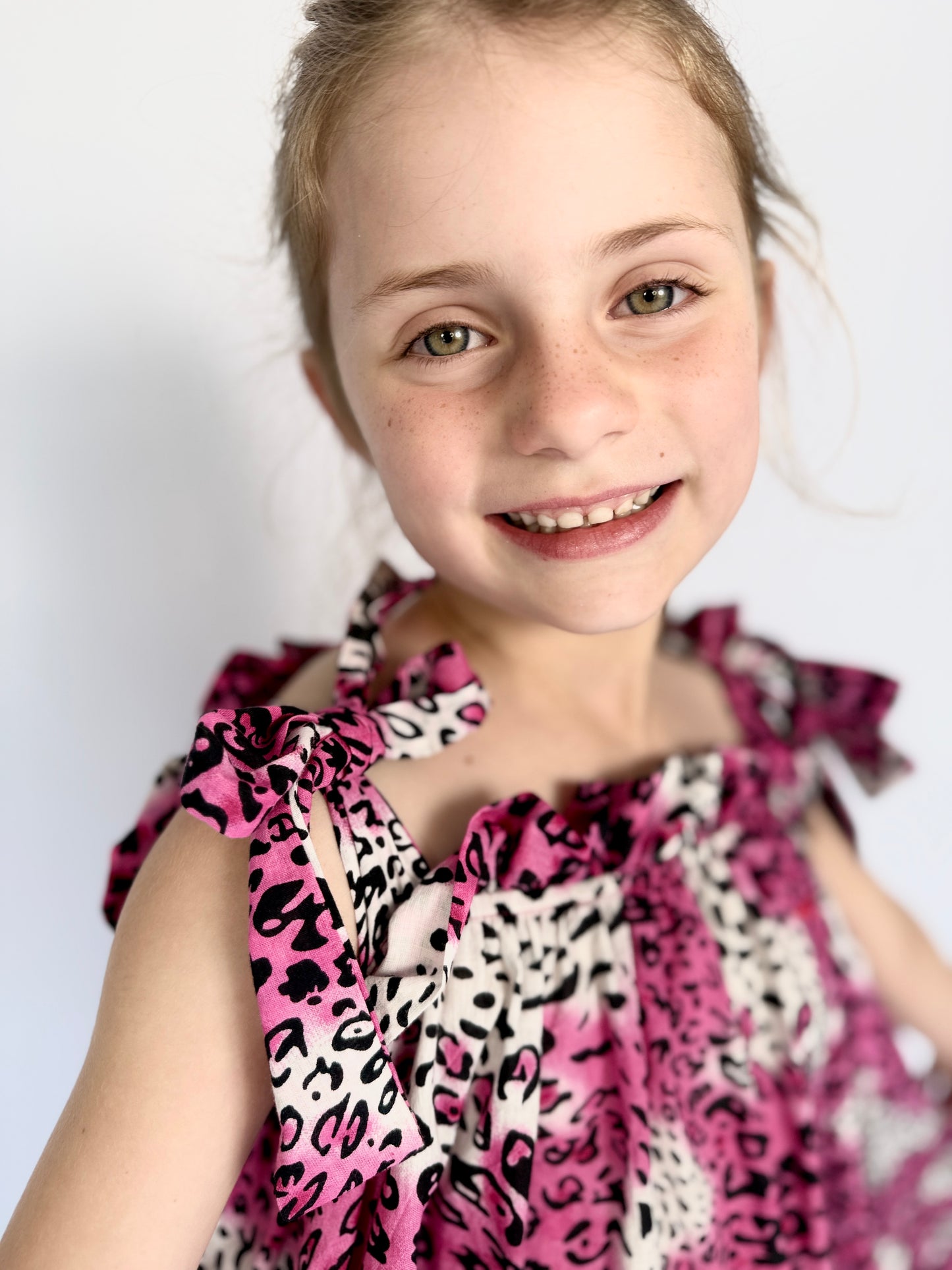 Girls Swirly Dress - Bright Pink Animal Print