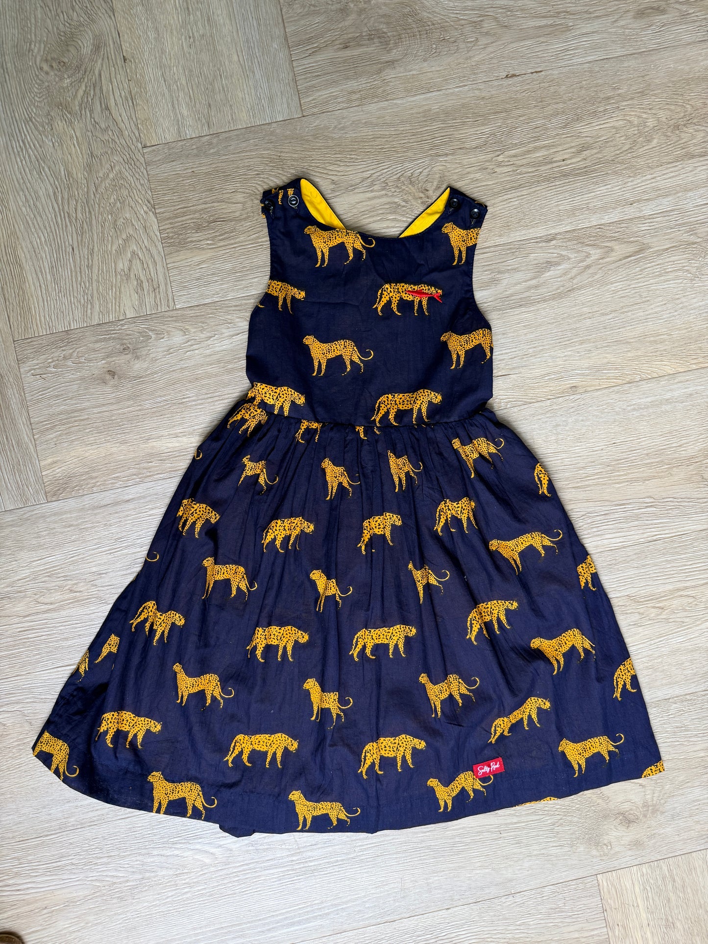 Girls Criss Cross back Dress - Navy w Orange Leopards