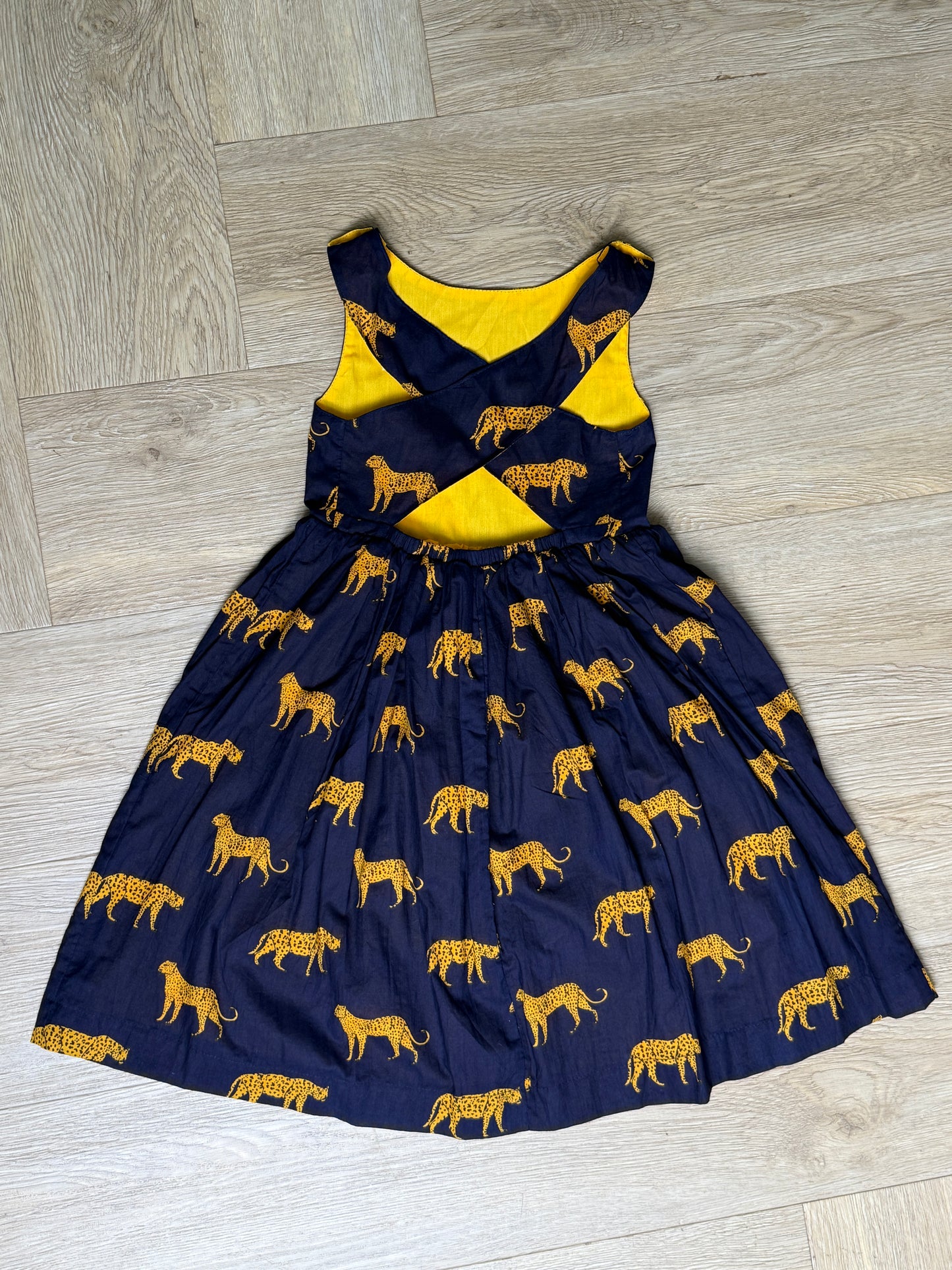 Girls Criss Cross back Dress - Navy w Orange Leopards