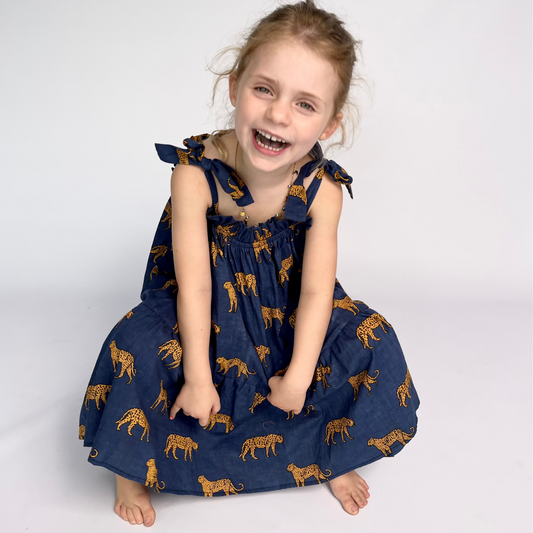 Girls Swirly Dress - Navy w Orange Leopards