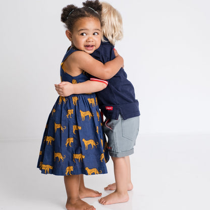 Girls Criss Cross back Dress - Navy w Orange Leopards