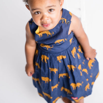 Girls Criss Cross back Dress - Navy w Orange Leopards