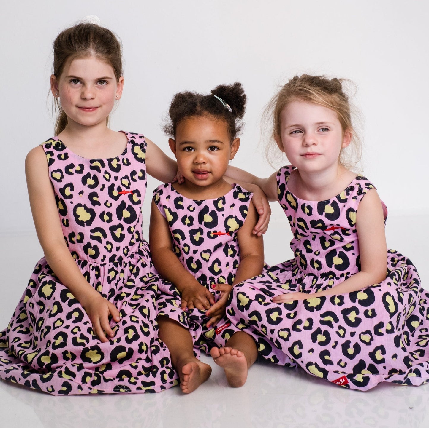 Girls Criss Cross back Dress - Pink and Black Animal Print