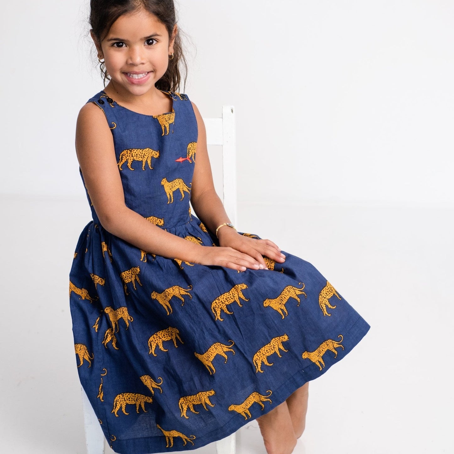 Girls Criss Cross back Dress - Navy w Orange Leopards